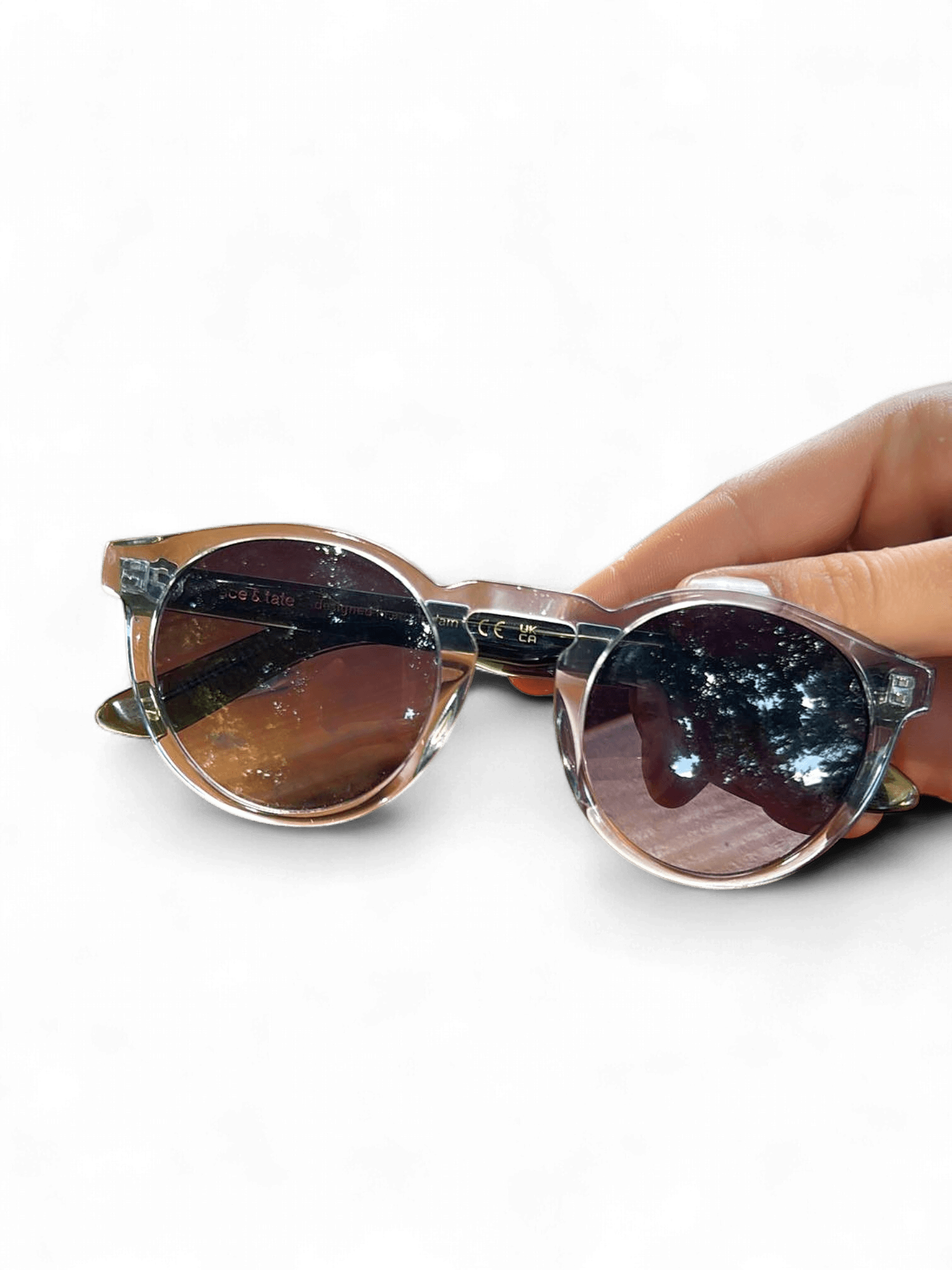 Transparenta runda solglasögon med mörka glas 1