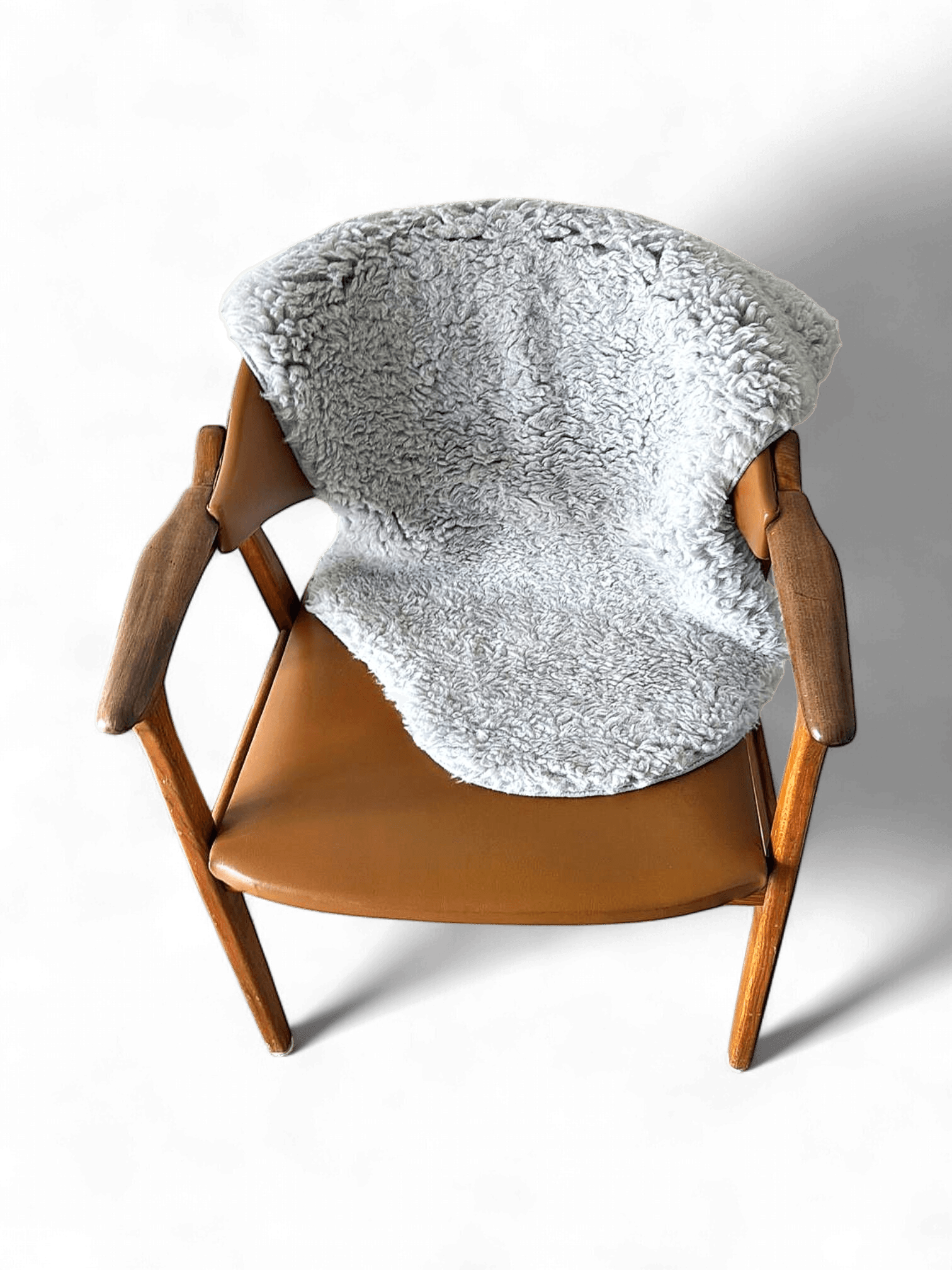 Mid-Century Wooden Armchair with Leather Seat and Sheepskin Throw 1