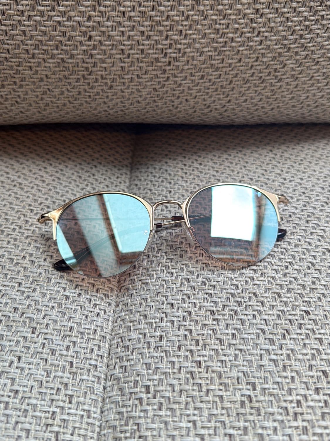 Carolina Lemke Berlin Round Sunglasses with Blue Mirrored Lenses 1